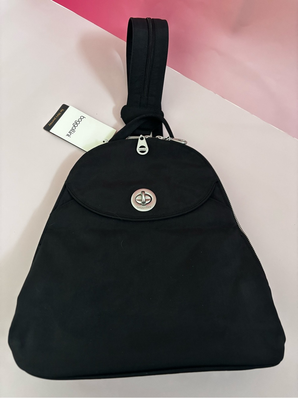 Baggallini Black Sling Cairo Backpack with Turn-Lock Detail-